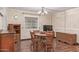 Charming dining area with a wooden table and chairs at 205 S Higley Rd # 189, Mesa, AZ 85206