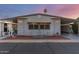 Attractive single-wide manufactured home with carport and landscaped yard at 205 S Higley Rd # 189, Mesa, AZ 85206