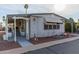 Mobile home with covered walkway and attractive landscaping at 205 S Higley Rd # 189, Mesa, AZ 85206