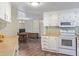 Clean and functional kitchen with ample counter space at 205 S Higley Rd # 189, Mesa, AZ 85206