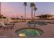 Relaxing pool and spa area with lounge chairs and patio furniture at 205 S Higley Rd # 189, Mesa, AZ 85206