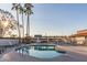 Inviting swimming pool with surrounding patio and lounge chairs at 205 S Higley Rd # 189, Mesa, AZ 85206