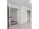 View of the neutral bedroom featuring a closet and the doorway to the bathroom at 2077 W Tanner Ranch Rd, San Tan Valley, AZ 85144