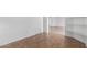 Empty living room with a hallway and neutral walls and tile flooring at 2077 W Tanner Ranch Rd, San Tan Valley, AZ 85144