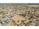 Wide aerial view of a neighborhood, featuring the subject property with a sizable yard at 2410 N 193Rd Ave, Buckeye, AZ 85396