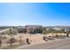 Aerial view of a single-story house with a large yard at 2410 N 193Rd Ave, Buckeye, AZ 85396