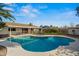 Relaxing kidney shaped pool, perfect for entertaining at 3001 W Villa Maria Dr, Phoenix, AZ 85053