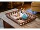 Close-up of a coffee table with decorative items, adding a touch of elegance to the living space at 305 W Lewis Ave, Phoenix, AZ 85003