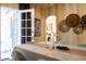 Stylish dining room offering views to an outdoor patio and a glimpse into the laundry area at 305 W Lewis Ave, Phoenix, AZ 85003