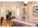 Well-appointed dining room featuring an elegant display shelf and an inviting view into other rooms at 305 W Lewis Ave, Phoenix, AZ 85003