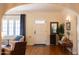 Entryway with hardwood floors, stylish decor, and ample natural light at 305 W Lewis Ave, Phoenix, AZ 85003