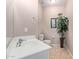 Clean bathroom with single sink vanity and tiled floor at 32211 N Lepa Dr, San Tan Valley, AZ 85144