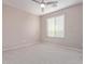 Simple bedroom with carpeted floor and ceiling fan at 32211 N Lepa Dr, San Tan Valley, AZ 85144