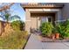 Front entry with walkway, landscaping, and a covered porch at 32211 N Lepa Dr, San Tan Valley, AZ 85144