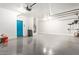 Clean and spacious garage with epoxy flooring and storage at 32211 N Lepa Dr, San Tan Valley, AZ 85144