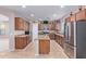 Kitchen with island, stainless steel appliances, and granite countertops at 32211 N Lepa Dr, San Tan Valley, AZ 85144