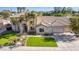 Two-story house with a large front yard, driveway, and mature landscaping at 3503 E Princeton Ct, Gilbert, AZ 85234