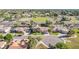 Wide aerial view of a house and neighborhood, showcasing surrounding landscape at 3503 E Princeton Ct, Gilbert, AZ 85234