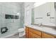 Clean bathroom with walk-in shower, toilet and wood vanity at 3503 E Princeton Ct, Gilbert, AZ 85234