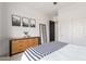 Serene bedroom with ample closet space and a dresser at 3503 E Princeton Ct, Gilbert, AZ 85234