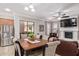 Bright dining area with large table and access to kitchen at 3503 E Princeton Ct, Gilbert, AZ 85234