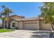 Two-story house with palm trees, a three-car garage, and a well-manicured lawn at 3503 E Princeton Ct, Gilbert, AZ 85234