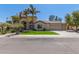 Two-story house with palm trees, a three-car garage, and a well-manicured lawn at 3503 E Princeton Ct, Gilbert, AZ 85234