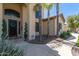 Elegant front entrance with a black door and lush landscaping at 3503 E Princeton Ct, Gilbert, AZ 85234