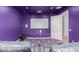 Home theater with purple walls and reclining seats at 3503 E Princeton Ct, Gilbert, AZ 85234
