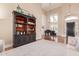 Elegant living room with high ceilings and large windows at 3503 E Princeton Ct, Gilbert, AZ 85234