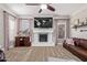 Living room with a fireplace and built-in media console at 3503 E Princeton Ct, Gilbert, AZ 85234