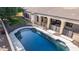 An inviting backyard pool with a patio and safety fence at 3503 E Princeton Ct, Gilbert, AZ 85234