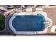 An overhead view of a clean, rectangular swimming pool at 3503 E Princeton Ct, Gilbert, AZ 85234