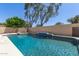 Inviting swimming pool with a diving board, surrounded by a spacious patio at 3503 E Princeton Ct, Gilbert, AZ 85234