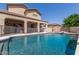 Relaxing pool area with a diving board and large patio at 3503 E Princeton Ct, Gilbert, AZ 85234