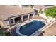 Backyard pool with a safety fence and spacious patio area at 3503 E Princeton Ct, Gilbert, AZ 85234