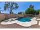 Refreshing swimming pool with a diving board and plenty of space for relaxation at 3503 E Princeton Ct, Gilbert, AZ 85234