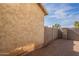 Backyard view of block wall and gravel at 402 N 66Th Ln, Phoenix, AZ 85043