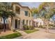 Two-story house with green accents and trees at 402 N 66Th Ln, Phoenix, AZ 85043