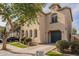 Two-story house with a garage and landscaping at 402 N 66Th Ln, Phoenix, AZ 85043
