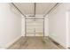 Empty garage with automatic door at 402 N 66Th Ln, Phoenix, AZ 85043