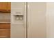White refrigerator with ice and water dispenser at 402 N 66Th Ln, Phoenix, AZ 85043