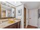 Modern bathroom with a vessel sink, granite countertop, and ample storage at 4141 N 31St St # 215, Phoenix, AZ 85016