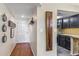 Bright hallway with wood floors and a view into the kitchen at 4141 N 31St St # 215, Phoenix, AZ 85016
