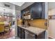 Kitchen features granite countertops and updated cabinetry at 4141 N 31St St # 215, Phoenix, AZ 85016