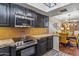 Granite countertops and stainless steel appliances in this updated kitchen at 4141 N 31St St # 215, Phoenix, AZ 85016