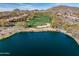 Stunning views of golf course and pond in a luxury community at 41717 N Moss Springs Ct, Anthem, AZ 85086