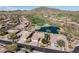 Homes situated near a golf course and a pond at 41717 N Moss Springs Ct, Anthem, AZ 85086