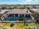 Luxury home with pool and landscaped backyard, offering stunning views at 41717 N Moss Springs Ct, Anthem, AZ 85086