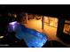 Nighttime aerial view of the backyard pool and patio at 41717 N Moss Springs Ct, Anthem, AZ 85086